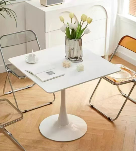 White square dining table set with transparent chairs